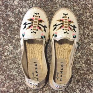 Manebi slip ons